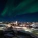 The city of Nuuk, Greenland at night. Reliable energy infrastructure is a critical lifeline for the Arctic capital during extreme weather