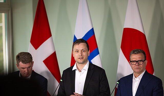 Greenlandic PM Jens-Frederik Nielsen speaking at a press conference with Danish and Faroese officials behind him