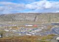 Aerial view of Kangerlussuaq, Greenland, showing the airport area and surrounding rocky landscape where a major data center is reportedly planned