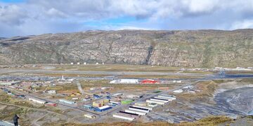 Aerial view of Kangerlussuaq, Greenland, showing the airport area and surrounding rocky landscape where a major data center is reportedly planned