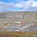 Aerial view of Kangerlussuaq, Greenland, showing the airport area and surrounding rocky landscape where a major data center is reportedly planned