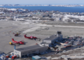 Aerial view of the new Nuuk International Airport terminal and runway in winter, Greenland